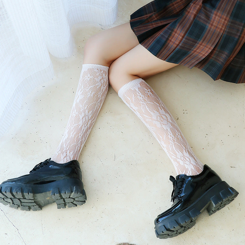 Lace Temptation: Sheer White Thigh-High Socks