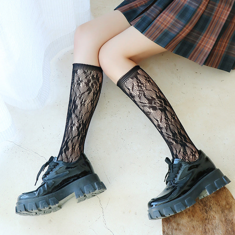 Lace Temptation: Sheer White Thigh-High Socks